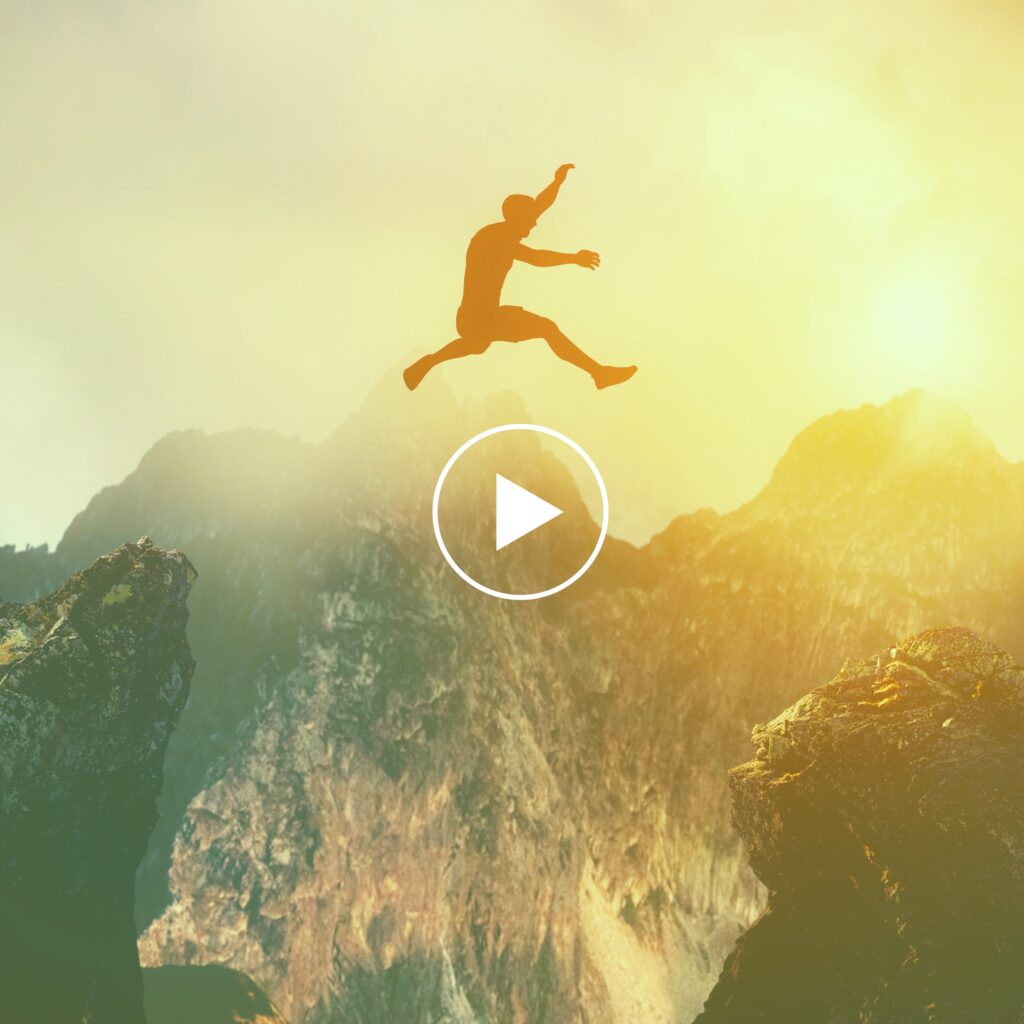 Man Jumping over valley