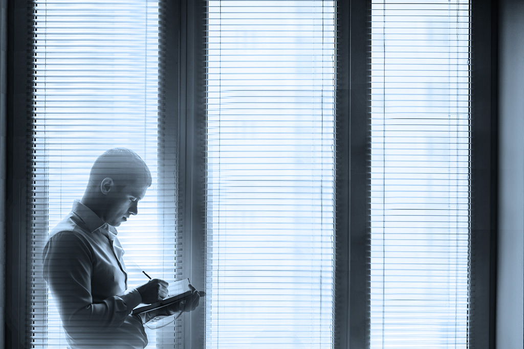 Accountant writing notes